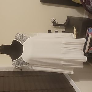 White pleated blouse, lined with lace detail